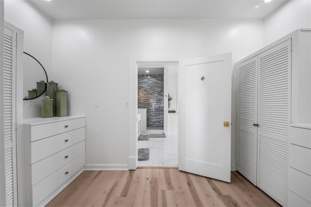 Primary suite dressing area with built-in storage
