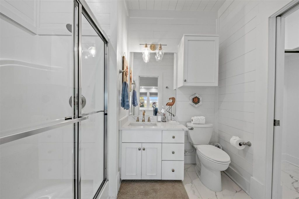 Guest bathroom with tub and shower combination