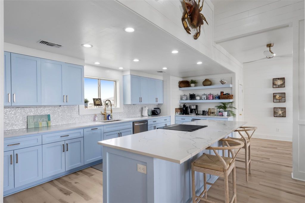 Kitchen open to the living area after full rebuild