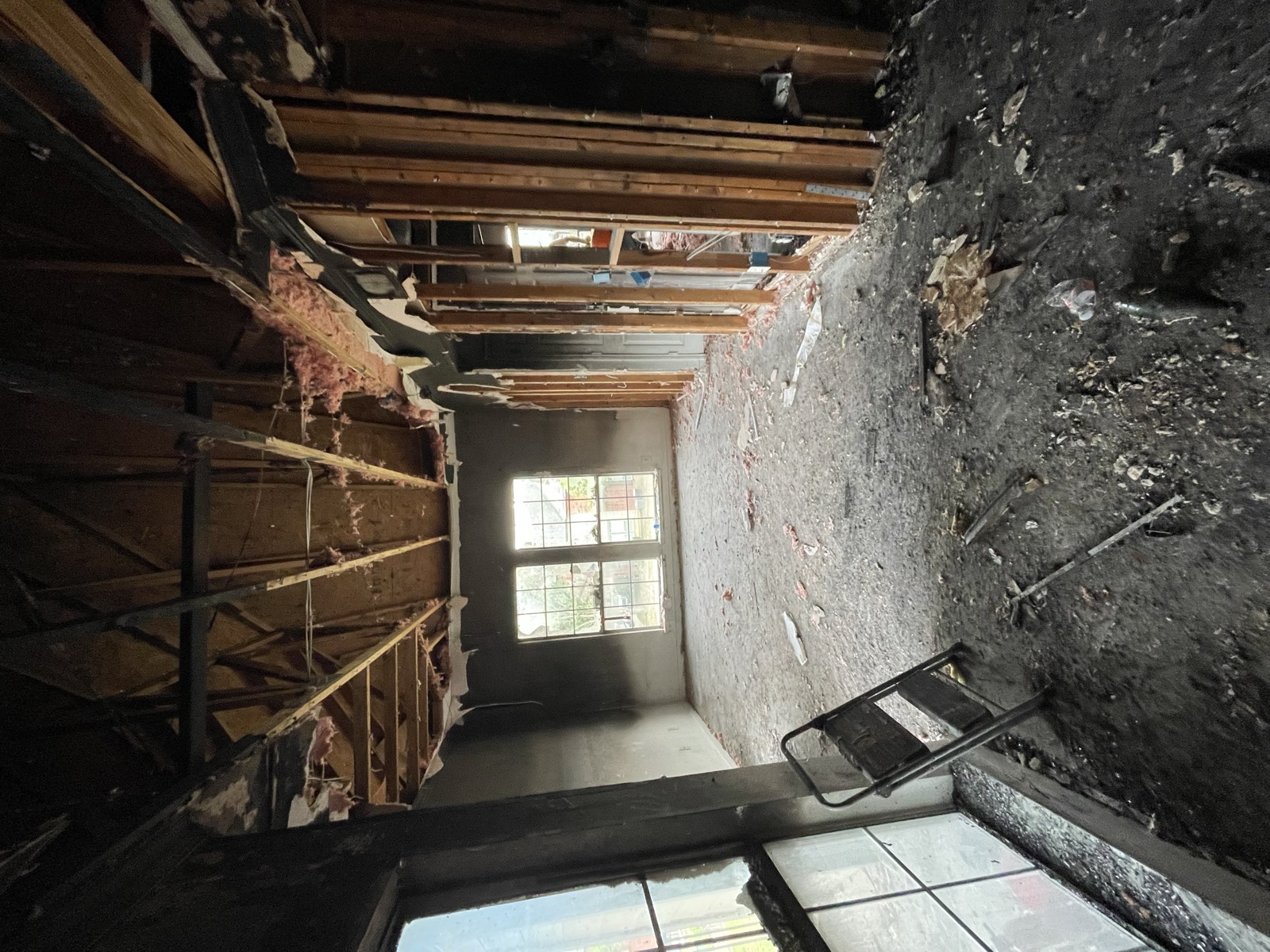 Interior during reconstruction, studs exposed